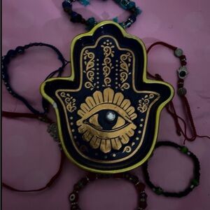 Evil eye jewelry holder with bracelets